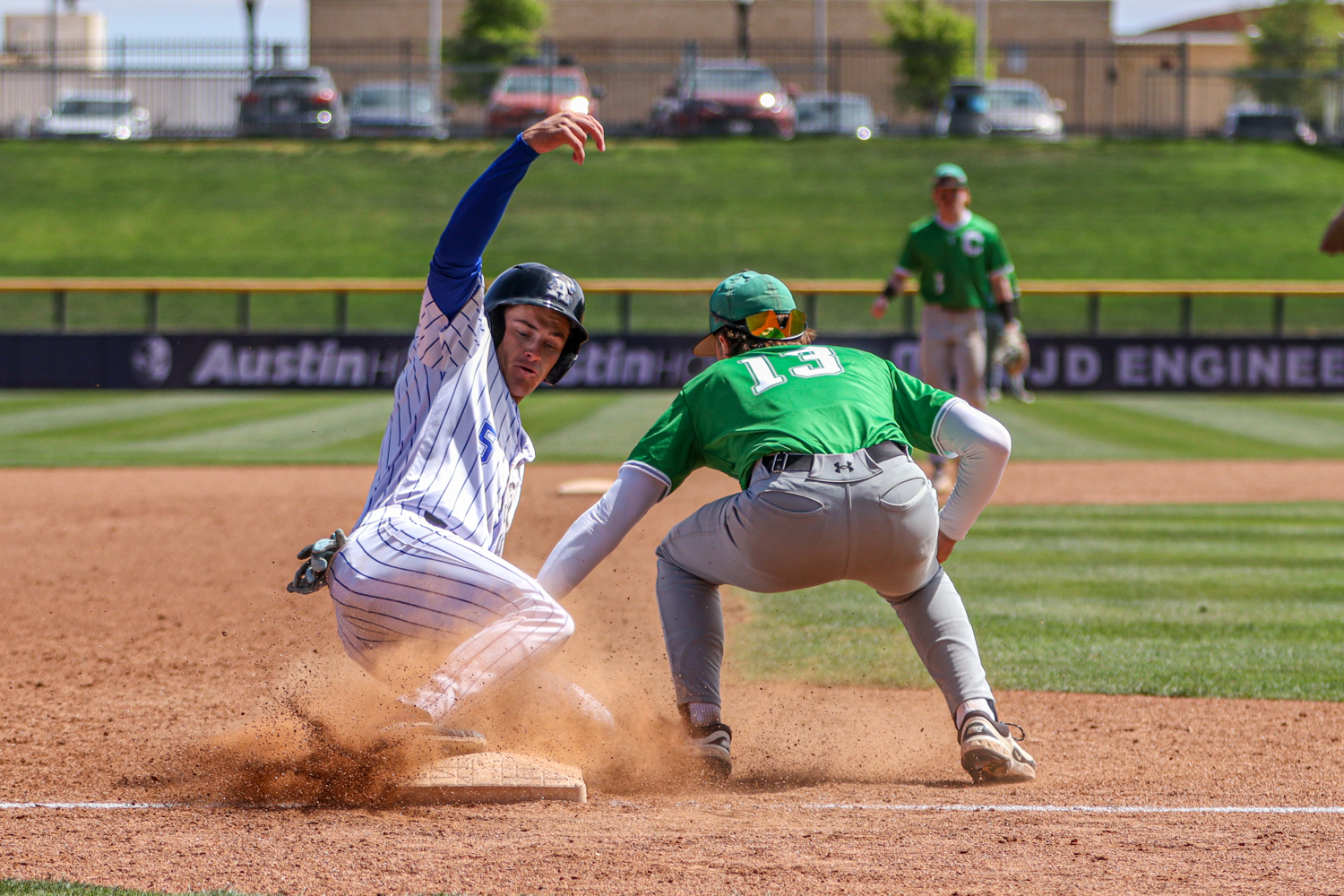 Colton McClure sliding into third base against Clarendon