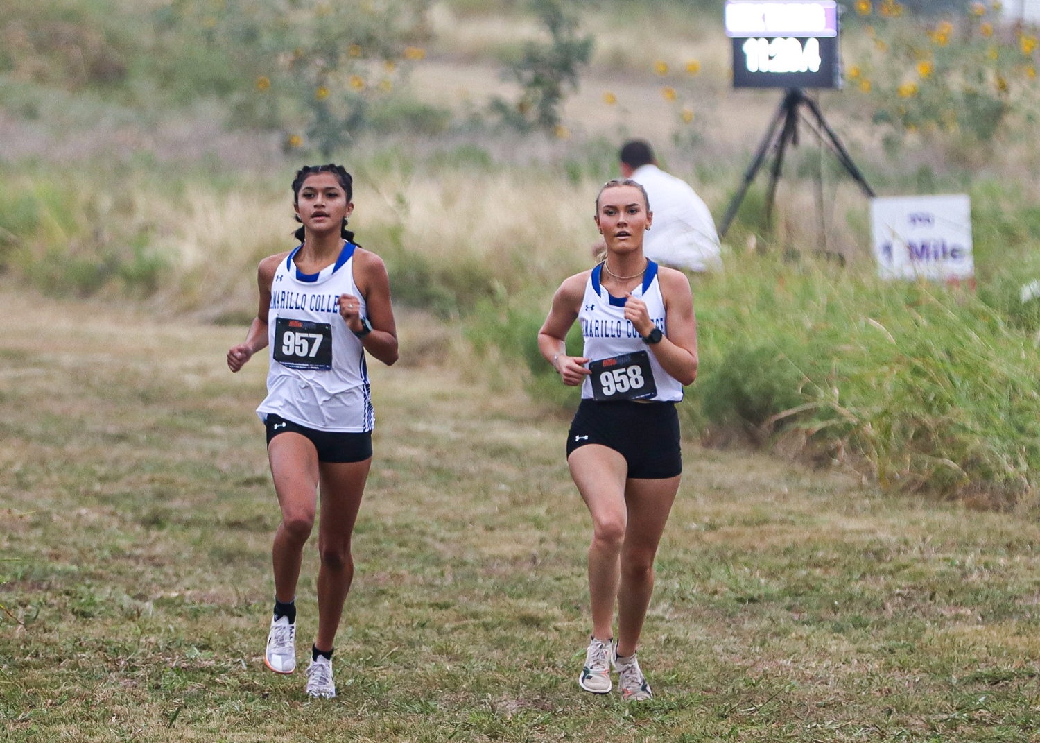Mia Lujan and Mallory Moore at the John McKenzie Invite
